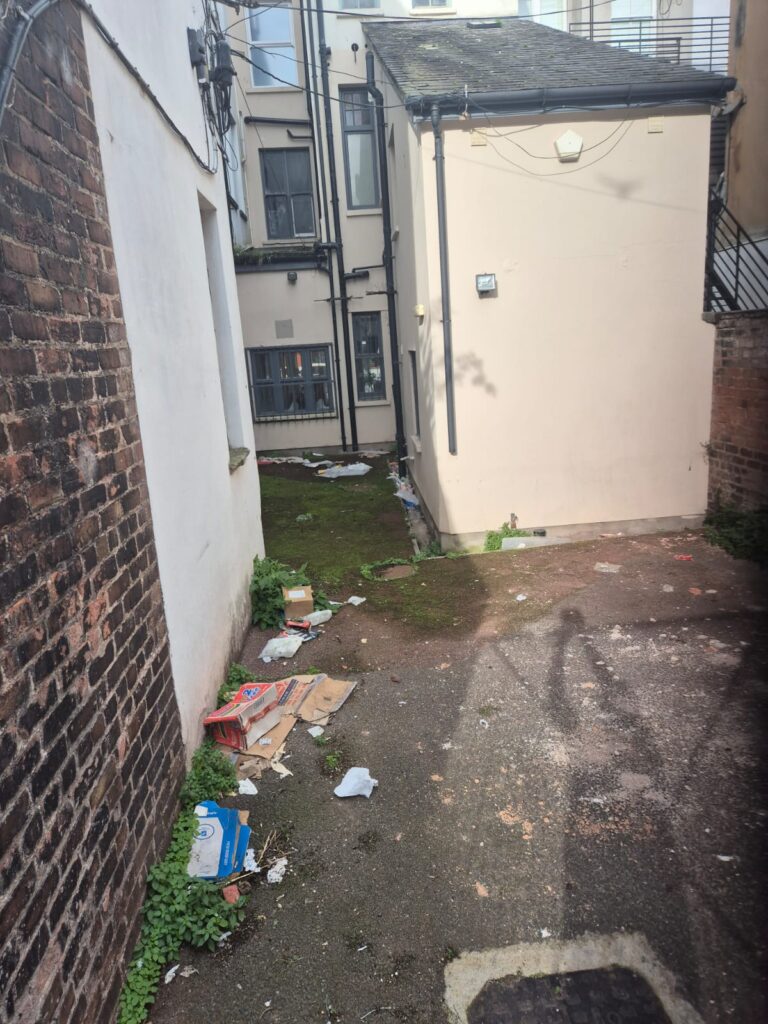 Courtyard before the bi-annual clean up in Colwyn Bay